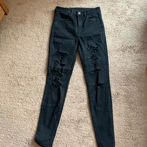 Black distressed skinny jeans